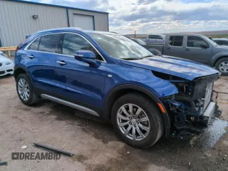 2023 Cadillac XT4 FWD Premium Luxury z VIN 1GYFZCR49PF104995, wystawiony jako Copart lot #53312695 z przebiegiem 28 647 mil mil oraz Szkody całkowita. Historia ofert i sprzedaży dostępna na DreamBid. Obrazek 4.