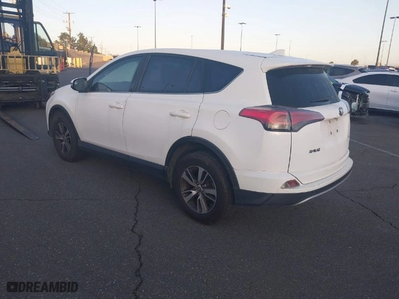 2018 Toyota RAV4 XLE with VIN JTMWFREV1JJ151684, listed as a IAAI auction lot 41745711 with 122,139 mi miles. Bid and sale history available at carsss.com. Image 3.