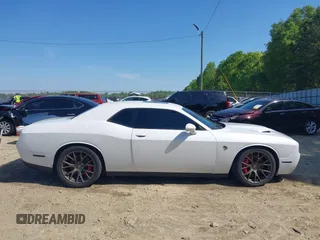 2016 Dodge Challenger SRT Hellcat с VIN 2C3CDZC99GH239296, выставлен на аукционе IAAI как лот 42057592 с пробегом 63 826 миль миль и . История ставок и продаж доступна на DreamBid. Изображение 13.