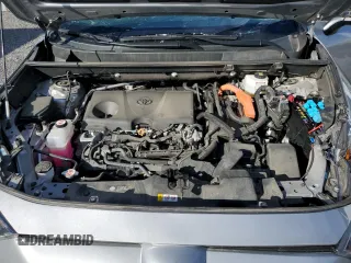 2023 Toyota RAV4 Hybrid XLE Premium with VIN 2T3BWRFV1PW157475, listed as a Copart auction lot 73371224 with 52,412 mi miles and Salvage title. Bid and sale history available at DreamBid. Image 12.
