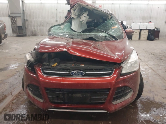 2016 Ford Escape Titanium with VIN 1FMCU9JXXGUA53238, listed as a IAAI auction lot 38472772 with Not Provided miles and . Bid and sale history available at DreamBid. Image 11.