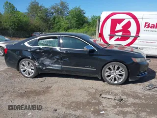 2014 Chevrolet Impala LTZ with VIN 1G1155S30EU121744, listed as a IAAI auction lot 41990517 with 140,573 mi miles and . Bid and sale history available at DreamBid. Image 13.