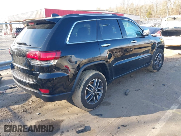 2021 Jeep Grand Cherokee 80th Anniversary with VIN 1C4RJFBG0MC801971, listed as a IAAI auction lot 41661098 with 31,961 mi miles and . Bid and sale history available at DreamBid. Image 4.