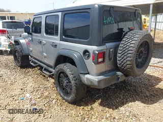2020 Jeep Wrangler Unlimited Sport Altitude с VIN 1C4HJXDN8LW127059, выставлен на аукционе IAAI как лот 41821194 с пробегом 152 744 миль миль и . История ставок и продаж доступна на DreamBid. Изображение 3.
