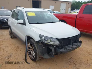 2016 Volkswagen Tiguan S with VIN WVGBV7AXXGW585445, listed as a IAAI auction lot 42083377 with 111,011 mi miles and . Bid and sale history available at DreamBid. Image 1.