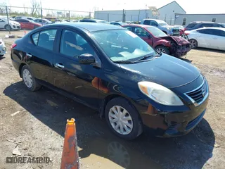 2012 Nissan Versa SV with VIN 3N1CN7AP0CL834668, listed as a IAAI auction lot 42032785 with 161,048 mi miles. Bid and sale history available at carsss.com. Image 1.