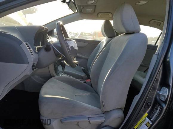2010 Toyota Corolla with VIN 2T1BU4EE1AC363990, listed as a Copart auction lot 52001595 with 244,000 mi miles and Salvage title. Bid and sale history available at DreamBid. Image 7.