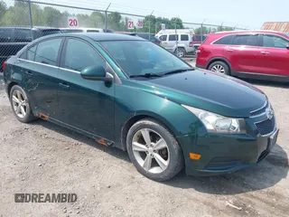 2014 Chevrolet Cruze 2LT z VIN 1G1PE5SB8E7383947, wystawiony jako IAAI lot #42410069 z przebiegiem 118 987 mil mil oraz . Historia ofert i sprzedaży dostępna na DreamBid. Obrazek 1.