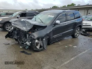 2015 Jeep Grand Cherokee Overland z VIN 1C4RJFCG2FC134919, wystawiony jako Copart lot #58643865 z przebiegiem 213 306 mil mil oraz Szkoda całkowita • Salvage title. Historia ofert i sprzedaży dostępna na DreamBid. Obrazek 1.