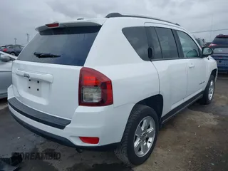 2014 Jeep Compass Altitude with VIN 1C4NJCBA8ED606589, listed as a IAAI auction lot 41939914 with 148,281 mi miles. Bid and sale history available at carsss.com. Image 4.