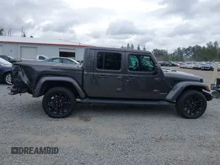 2021 Jeep Gladiator High Altitude with VIN 1C6HJTFG8ML567087, listed as a IAAI auction lot 42549990 with 30,437 mi miles and . Bid and sale history available at DreamBid. Image 14.