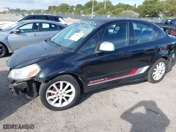 2008 Suzuki SX4 Convenience Pkg with VIN JS2YC415985102350, listed as a IAAI auction lot 41626643 with 210,929 mi miles. Bid and sale history available at carsss.com. Image 2.