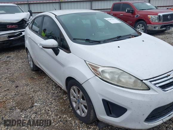2012 Ford Fiesta SE with VIN 3FADP4BJ0CM220742, listed as a IAAI auction lot 42207303 with 175,875 mi miles and . Bid and sale history available at DreamBid. Image 6.