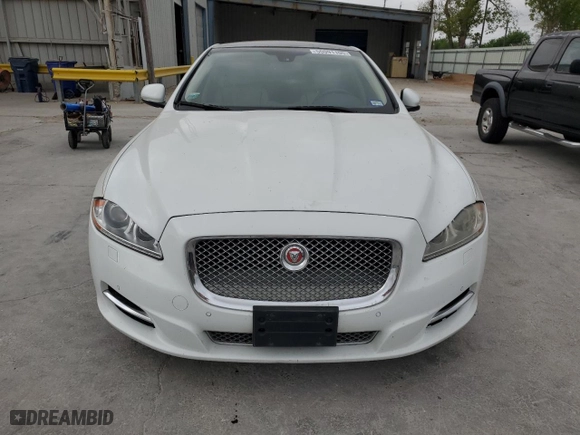 2014 Jaguar XJ with VIN SAJWJ2GD6E8V65987, listed as a Copart auction lot 50091105 with 136,080 mi miles and Clean Title. Bid and sale history available at carsss.com. Image 5.