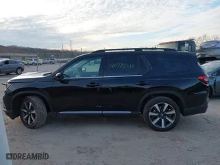 2024 Honda Pilot Touring with VIN 5FNYG1H72RB007519, listed as a IAAI auction lot 40973780 with 24,908 mi miles. Bid and sale history available at carsss.com. Image 14.