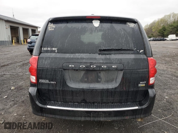 2019 Dodge Grand Caravan SXT with VIN 2C4RDGCG4KR580424, listed as a Copart auction lot 52715245 with 130,696 mi miles and Salvage Title. Bid and sale history available at DreamBid. Image 6.