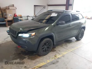 2020 Jeep Cherokee Trailhawk Elite with VIN 1C4PJMBN2LD538076, listed as a IAAI auction lot 42219282 with 53,773 mi miles and . Bid and sale history available at DreamBid. Image 17.