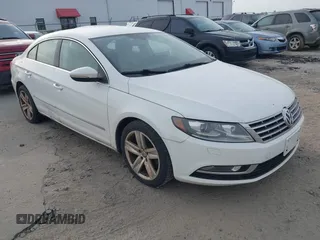 2013 Volkswagen CC Sport Plus z VIN WVWBP7AN0DE502703, wystawiony jako IAAI lot #41779386 z przebiegiem 216 531 mil mil oraz . Historia ofert i sprzedaży dostępna na DreamBid. Obrazek 1.