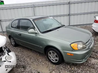 2003 Hyundai Accent GL with VIN KMHCG35C23U264701, listed as a Copart auction lot 80029154 with 142,090 mi miles and Salvage Title. Bid and sale history available at carsss.com. Image 4.