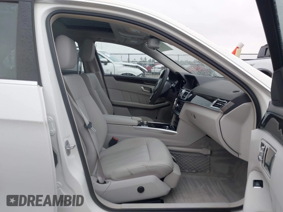 2014 Mercedes-Benz E 550 Sport with VIN WDDHF9BB3EB017140, listed as a IAAI auction lot 41424799 with 32,537 mi miles and . Bid and sale history available at DreamBid. Image 5.