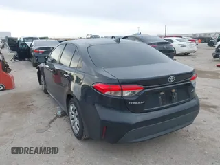2020 Toyota Corolla LE with VIN 5YFEPRAE0LP021439, listed as a IAAI auction lot 41278038 with 138,614 mi miles. Bid and sale history available at carsss.com. Image 3.