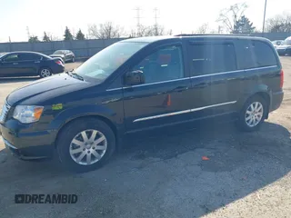 2015 Chrysler Town & Country Touring with VIN 2C4RC1BG0FR672993, listed as a IAAI auction lot 41797935 with 116,815 mi miles. Bid and sale history available at carsss.com. Image 17.
