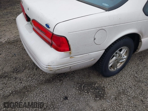 1996 Ford Thunderbird LX z VIN 1FALP6246TH160357, wystawiony jako IAAI lot #41442234 z przebiegiem 99 815 mil mil oraz . Historia ofert i sprzedaży dostępna na DreamBid. Obrazek 6.