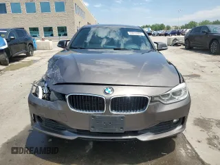 2014 BMW 3 Series 320i xDrive with VIN WBA3C3C53EK200375, listed as a Copart auction lot 59915595 with 104,320 mi miles and Salvage title. Bid and sale history available at DreamBid. Image 5.
