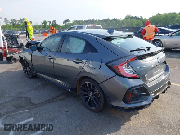 2021 Honda Civic Sport with VIN SHHFK7H44MU217741, listed as a IAAI auction lot 42029373 with 68,572 mi miles and . Bid and sale history available at DreamBid. Image 3.