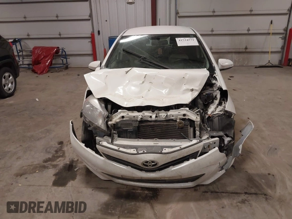 2013 Toyota Yaris L with VIN JTDKTUD33DD566664, listed as a IAAI auction lot 41524571 with 148,050 mi miles and . Bid and sale history available at DreamBid. Image 12.