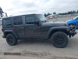 2018 Jeep Wrangler Unlimited Sport z VIN 1C4BJWDG4JL932122, wystawiony jako IAAI lot #42618973 z przebiegiem 66 494 mil mil oraz . Historia ofert i sprzedaży dostępna na DreamBid. Obrazek 14.