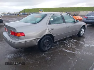 2000 Toyota Camry CE z VIN 4T1BG22K3YU691054, wystawiony jako IAAI lot #41896526 z przebiegiem 303 993 mil mil oraz . Historia ofert i sprzedaży dostępna na DreamBid. Obrazek 4.