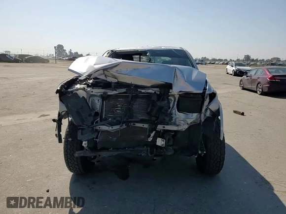 2016 Toyota Tacoma SR z VIN 5TFRX5GN2GX052555, wystawiony jako Copart lot #55353025 z przebiegiem 134 974 mil mil oraz Szkoda całkowita • Salvage title. Historia ofert i sprzedaży dostępna na DreamBid. Obrazek 14.