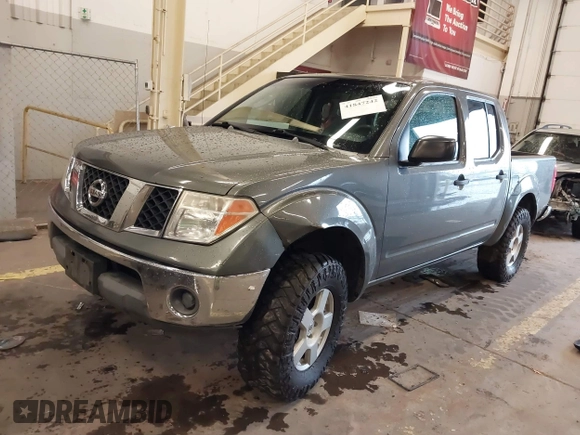 2005 Nissan Frontier 4WD LE with VIN 1N6AD07W95C411421, listed as a IAAI auction lot 41847242 with 209,816 mi miles. Bid and sale history available at carsss.com. Image 17.