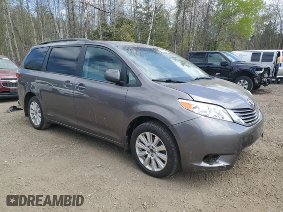 2015 Toyota Sienna LE with VIN 5TDJK3DC7FS121635, listed as a Copart auction lot 55999945 with 139,642 mi miles and Salvage title. Bid and sale history available at DreamBid. Image 4.