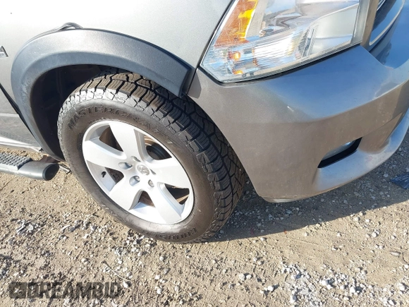 2011 Ram 1500 ST with VIN 1D7RV1GTXBS556473, listed as a IAAI auction lot 40711248 with 210,581 mi miles. Bid and sale history available at carsss.com. Image 6.