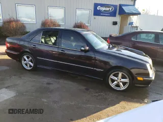 2000 Mercedes-Benz E-Class with VIN WDBJF70J5YB146123, listed as a Copart auction lot 80291293 with 195,787 mi miles and Non Repairable. Bid and sale history available at carsss.com. Image 4.