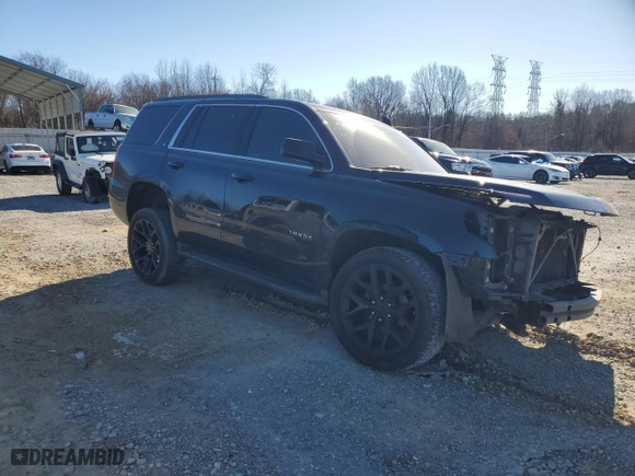 2019 Chevrolet Tahoe LT with VIN 1GNSCBKC5KR353908, listed as a Copart auction lot 41826985 with 97,949 mi miles and Clean Title. Bid and sale history available at carsss.com. Image 4.