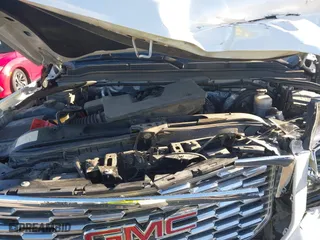 2018 GMC Yukon XL Denali with VIN 1GKS2HKJ2JR183877, listed as a IAAI auction lot 41652039 with 123,075 mi miles. Bid and sale history available at carsss.com. Image 10.