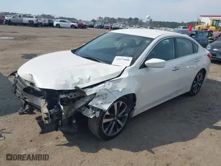 2016 Nissan Altima 2.5 S with VIN 1N4AL3AP4GC271084, listed as a IAAI auction lot 41677040 with 183,123 mi miles. Bid and sale history available at carsss.com. Image 18.