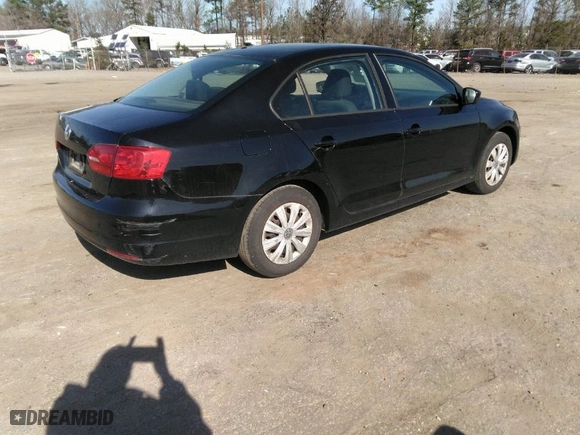 2014 Volkswagen Jetta Sedan S with VIN 3VW2K7AJ5EM310715, listed as a IAAI auction lot 41843290 with 257,801 mi miles. Bid and sale history available at carsss.com. Image 4.