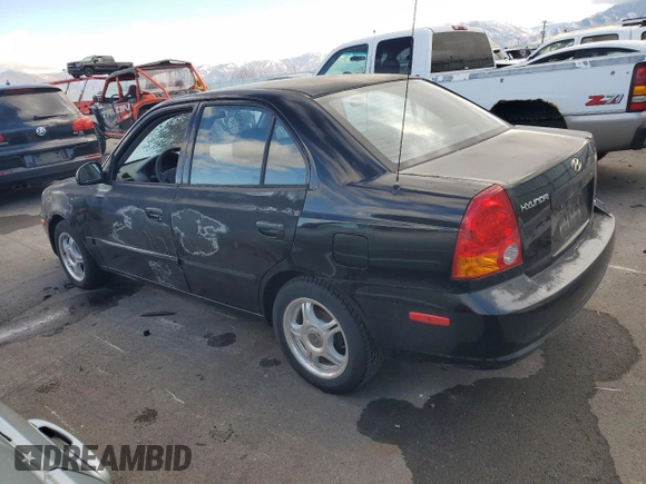 2003 Hyundai Accent GL with VIN KMHCG45C43U429167, listed as a Copart auction lot 79658124 with 80,926 mi miles and Clean Title. Bid and sale history available at carsss.com. Image 2.