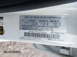 2013 Mazda 3 i SV with VIN JM1BL1TF5D1744232, listed as a IAAI auction lot 41976808 with 138,108 mi miles. Bid and sale history available at carsss.com. Image 9.
