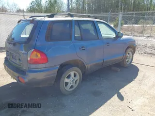 2003 Hyundai Santa Fe GLS with VIN KM8SC73D23U454976, listed as a IAAI auction lot 41777273 with 191,402 mi miles. Bid and sale history available at carsss.com. Image 4.