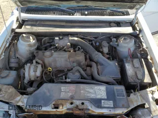 1986 Ford Tempo z VIN 1FABP22X4GK263512, wystawiony jako Copart lot #50618855 z przebiegiem 392 265 mil mil oraz Tytuł czysty. Historia ofert i sprzedaży dostępna na DreamBid. Obrazek 11.