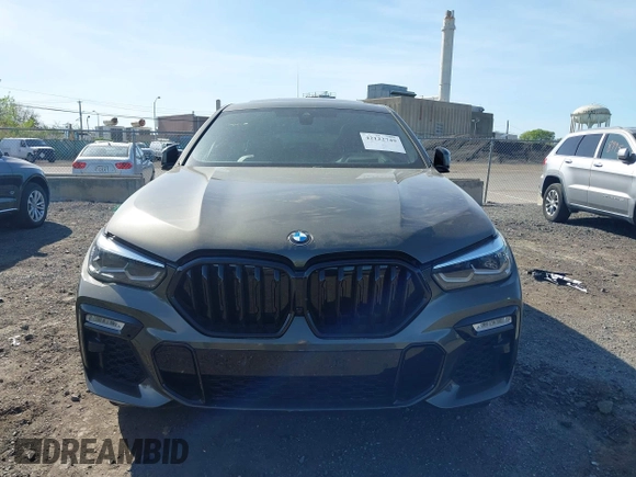 2021 BMW X6 sDrive40i z VIN 5UXCY4C06M9F26841, wystawiony jako IAAI lot #42122749 z przebiegiem 10 072 mil mil oraz . Historia ofert i sprzedaży dostępna na DreamBid. Obrazek 11.
