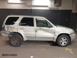 2005 Ford Escape Limited with VIN 1FMYU94195KB62327, listed as a IAAI auction lot 41910709 with 116,086 mi miles. Bid and sale history available at carsss.com. Image 14.
