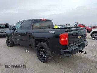 2017 Chevrolet Silverado 1500 LT with VIN 1GCUKREC2HF208232, listed as a IAAI auction lot 40933445 with 105,928 mi miles and . Bid and sale history available at DreamBid. Image 3.