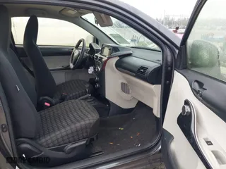 2014 Scion iQ with VIN JTNJJXB03EJ030212, listed as a IAAI auction lot 41091281 with 78,667 mi miles. Bid and sale history available at carsss.com. Image 5.