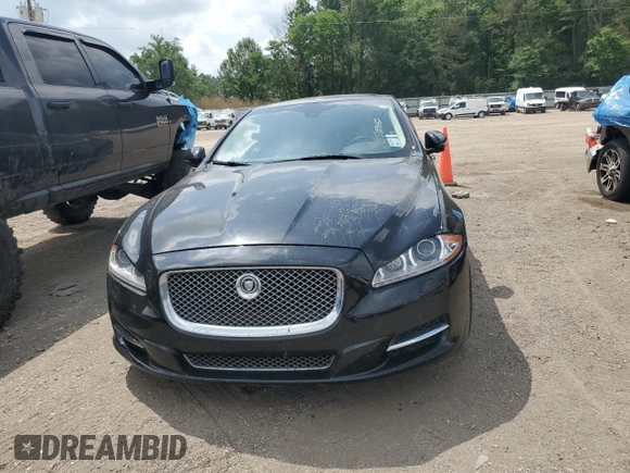 2015 Jaguar XJ with VIN SAJWA2GZXF8V88962, listed as a Copart auction lot 53919035 with 129,987 mi miles and Salvage Title. Bid and sale history available at carsss.com. Image 5.